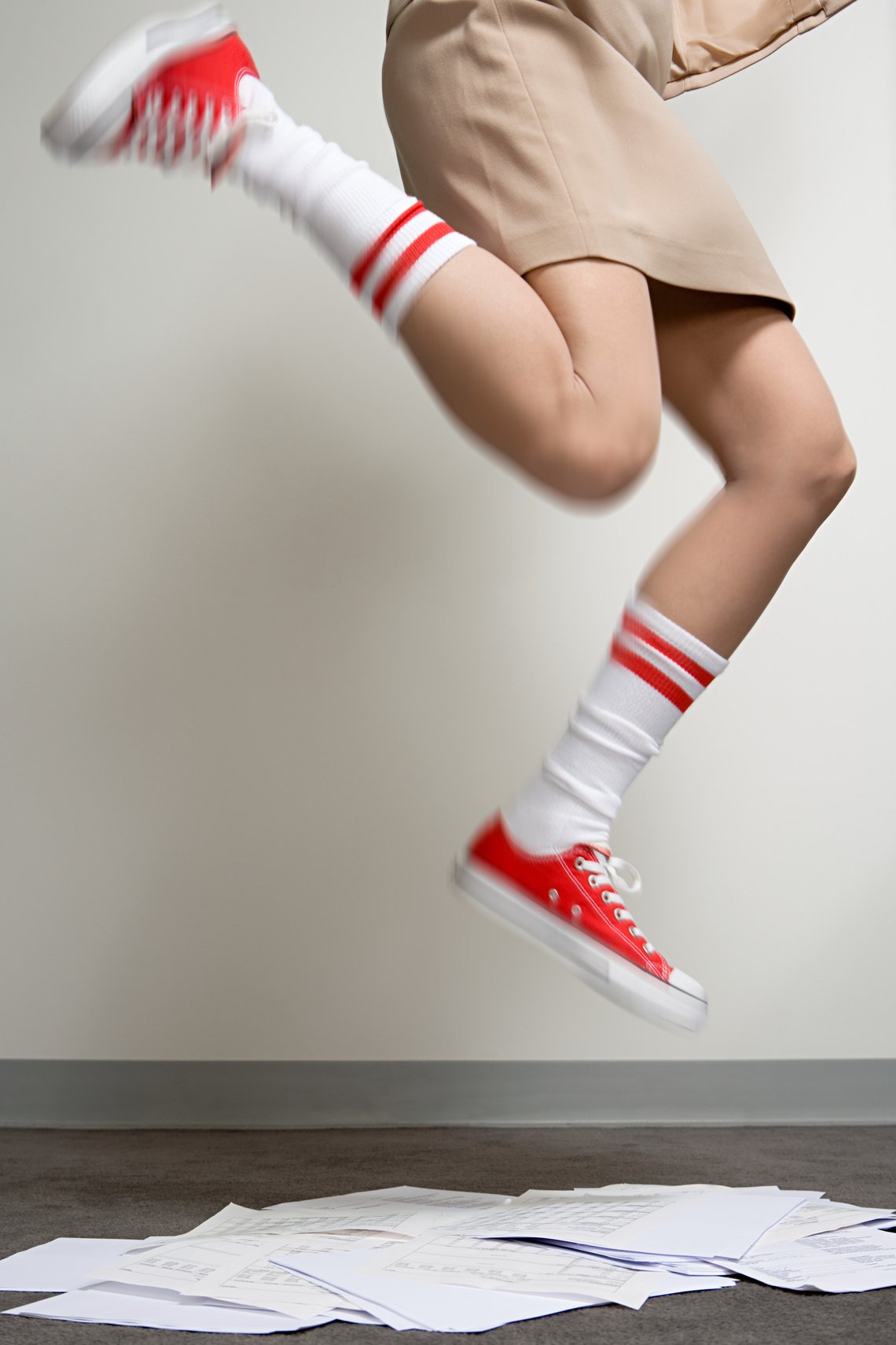 Female office worker wearing baseball boots